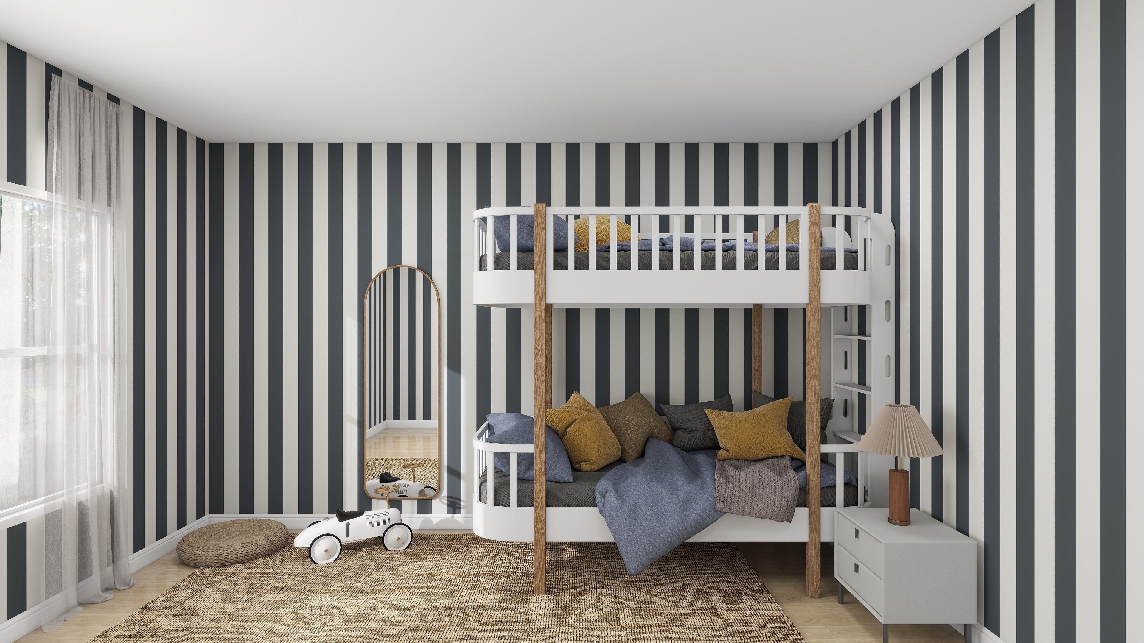 A childrens room featuring munks and mes Circus Stripe Wallpaper in Denim, a cozy bunk bed with cushions and blankets, a floor mirror, toy car, nightstand with lamp, woven rug, and colorful soft cushion on the wooden floor.