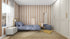 The bedroom features a cozy vibe with Circus Stripe Wallpaper Latte in beige and white by Munks and Me, a single bed with blue bedding, a white bedside table holding a lamp, basket, and poufs. Sheer-curtained windows let in natural light while a banner decorates the wall above the bed.