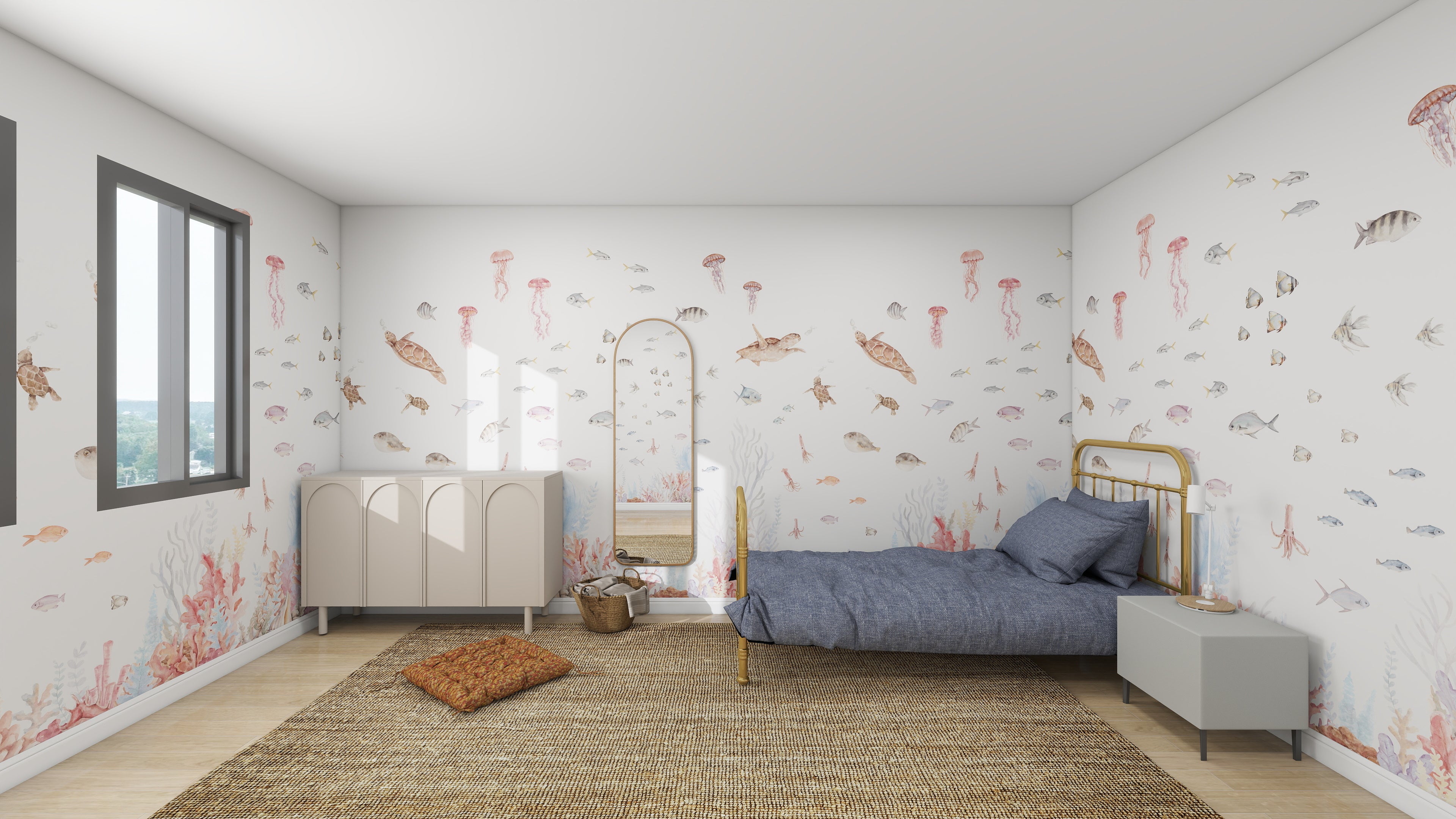 This serene bedroom showcases the Fish Tank Wallpaper Mural by munks and me, featuring fish, jellyfish, and coral. A gray bed, oval mirror, beige cabinet, and woven rug enhance the ocean theme. Natural light filters through a left-side window, enhancing the tranquil aquatic atmosphere.