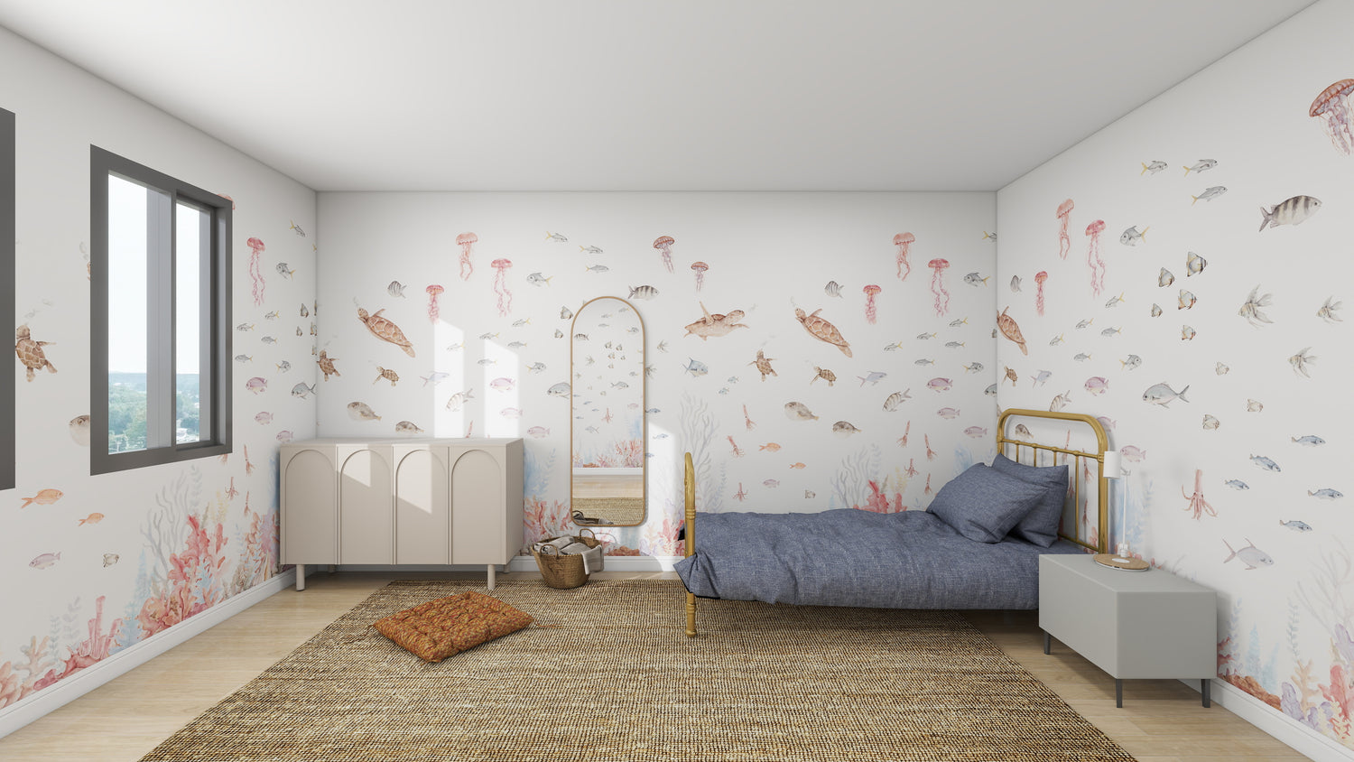 A bedroom featuring the Fish Tank Wallpaper Mural by munks and me mimics an artistic online sample with its gold-framed bed, blue bedding, white scalloped dresser, round woven rug, tall mirror, and small bedside table near two sunlit windows.