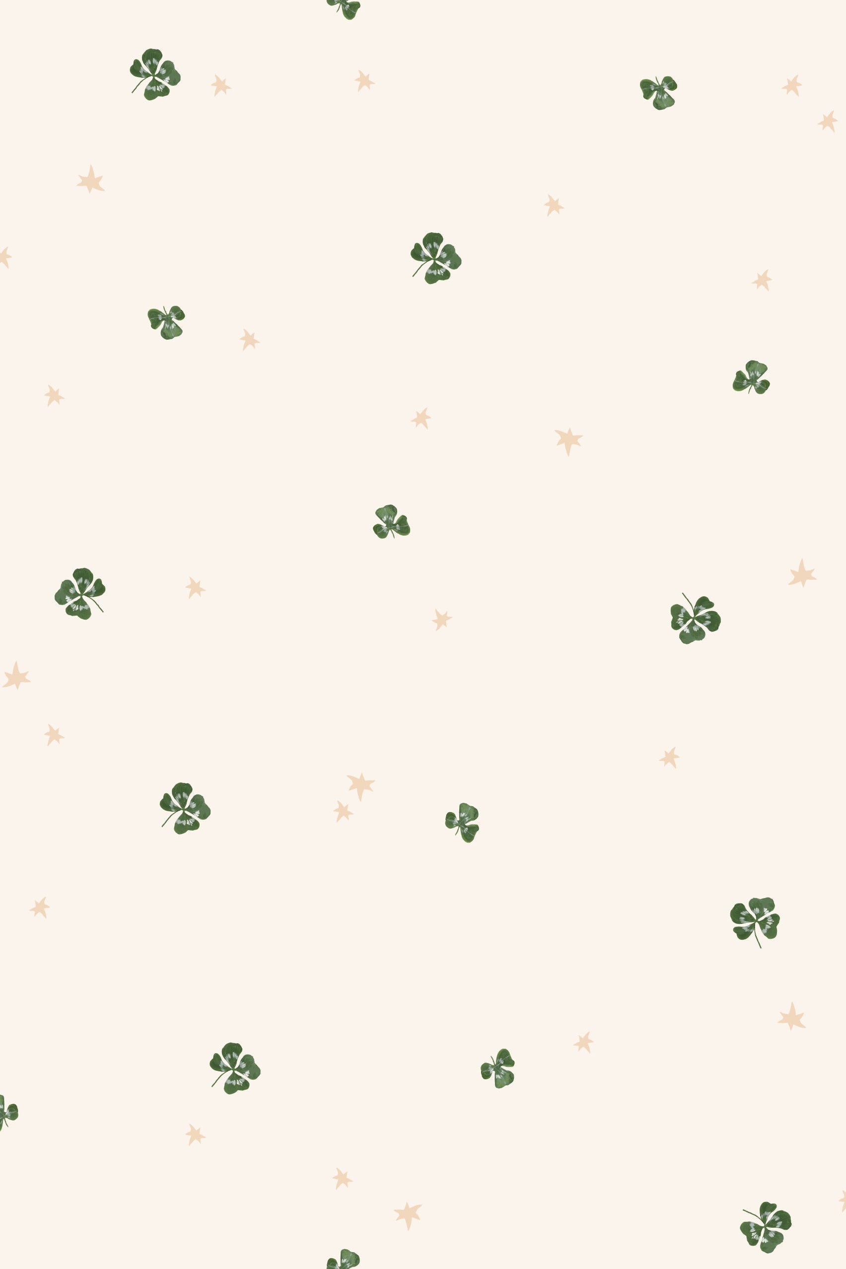 Pattern of small green clover leaves on a beige background