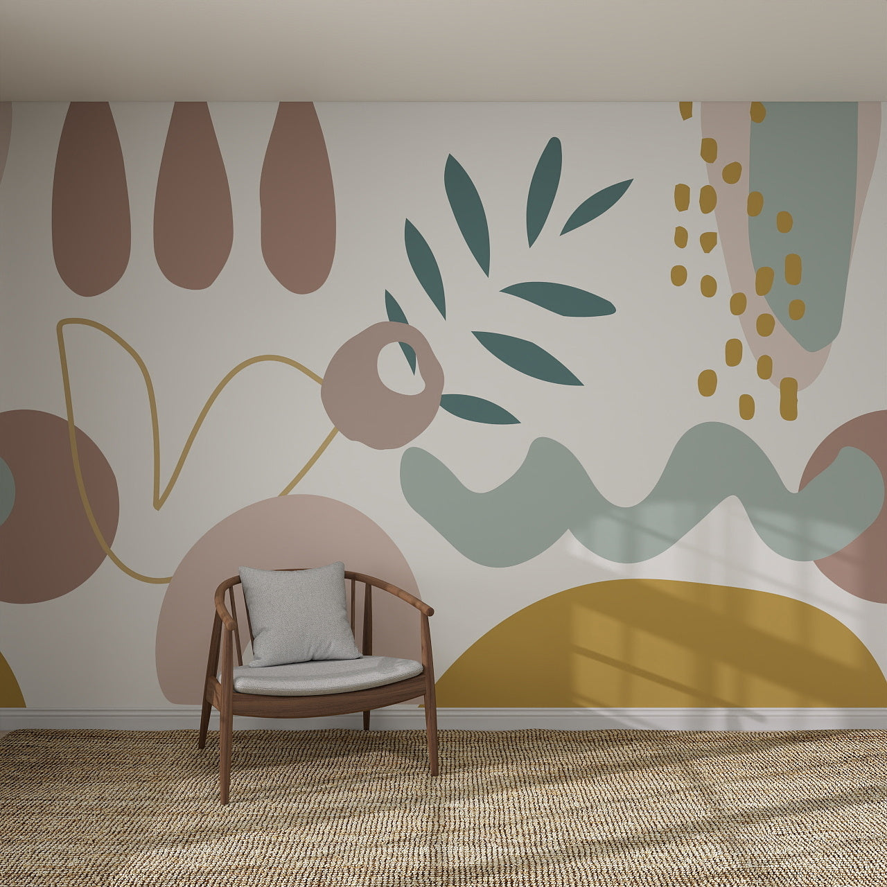 A wooden chair with a gray cushion sits before the Abstract Wallpaper Mural, which showcases muted pink, green, yellow, and blue shapes. Sunlight gently casts soft shadows across the rug and wall.