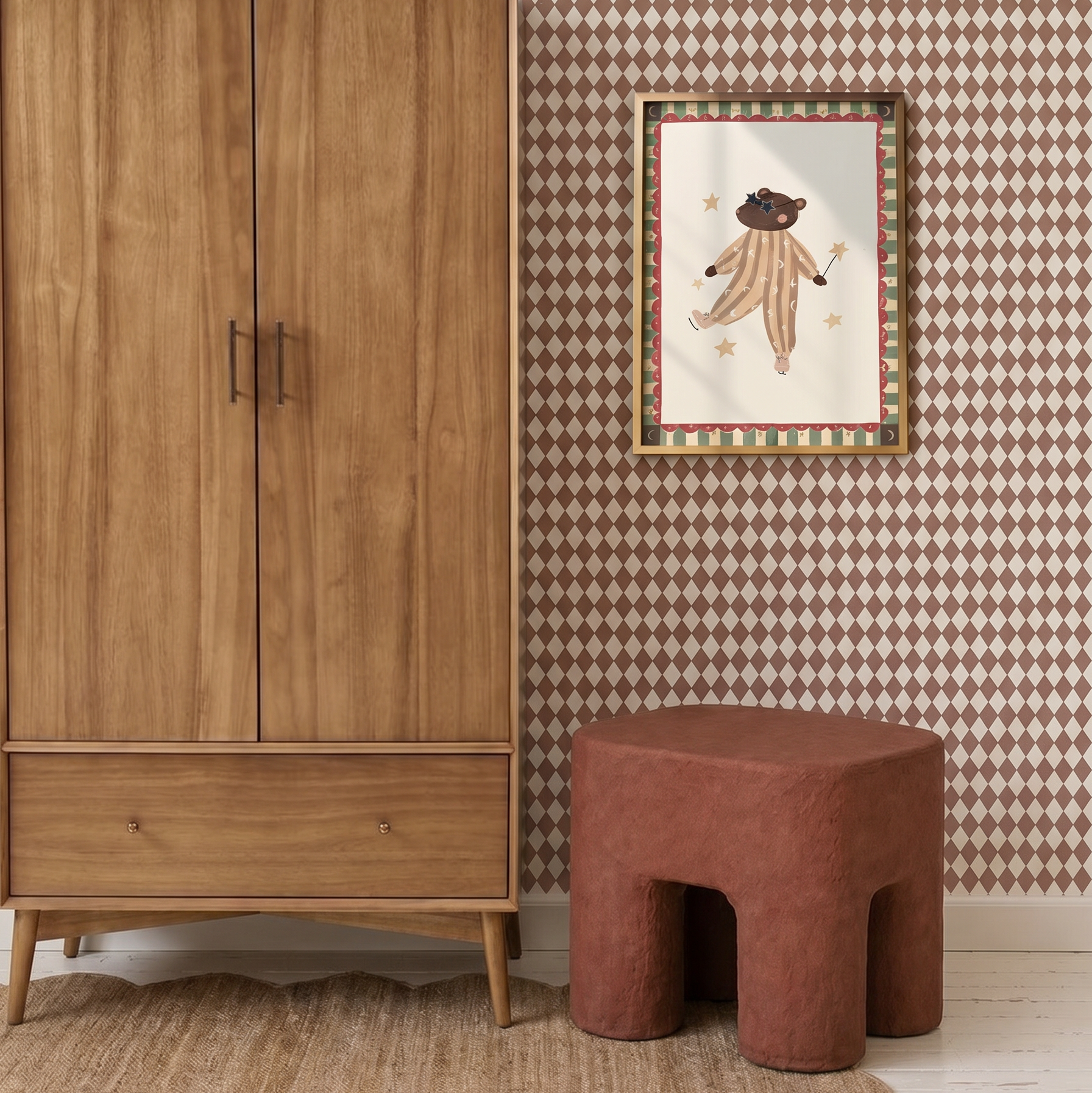 A cozy room with Diamond Dancer Wallpaper in Stone Rose, a wooden wardrobe, a textured brown stool, a rug, and a framed picture of a bear in a clown outfit on the wall.
