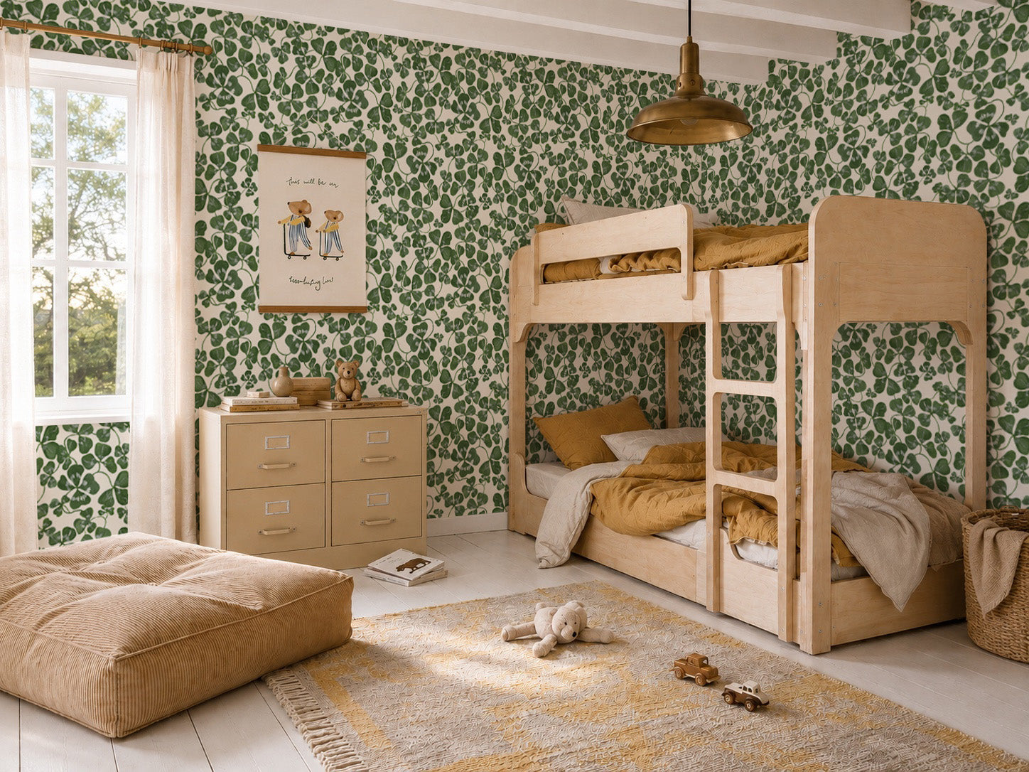 Children’s bedroom featuring How Lucky We Are Clovers Wallpaper, a wooden bunk bed, beige dresser, soft pouf, teddy bear on a rug, and a window with sheer curtains allowing in natural light.