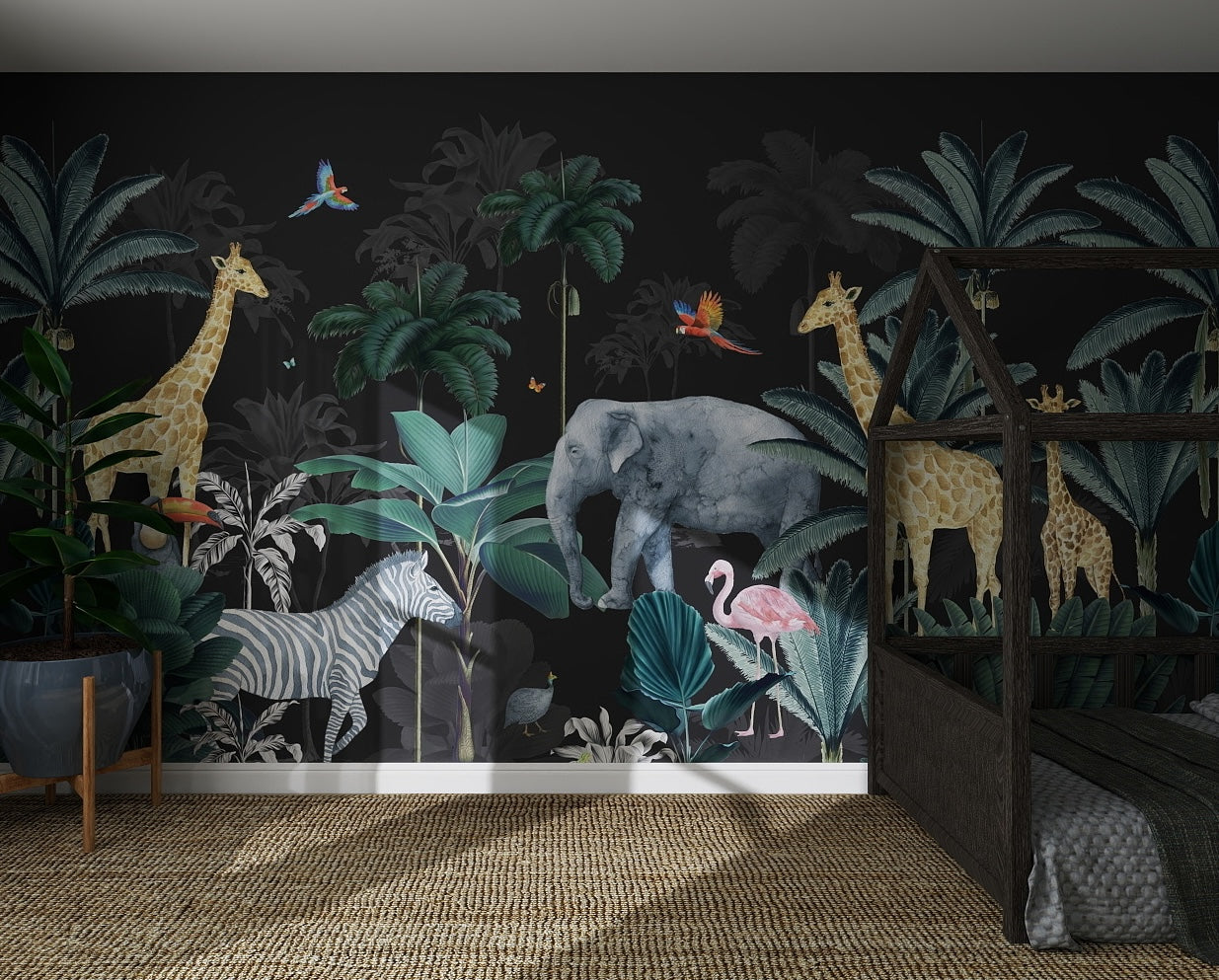A children’s bedroom comes alive with Charcoal Jungle Wallpaper | Sample, featuring jungle animals, tropical plants, and vibrant birds above. The wallpaper adds playful energy and an inviting feel to the space alongside a wooden bed frame.