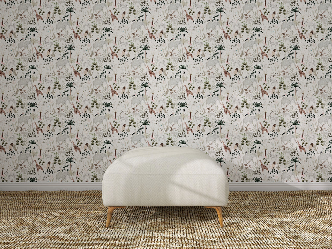 A white upholstered ottoman sits on a woven rug in front of a wall decorated with Jungle Dreams Wallpaper Repeat Pattern, showcasing colorful botanical and animal designs.