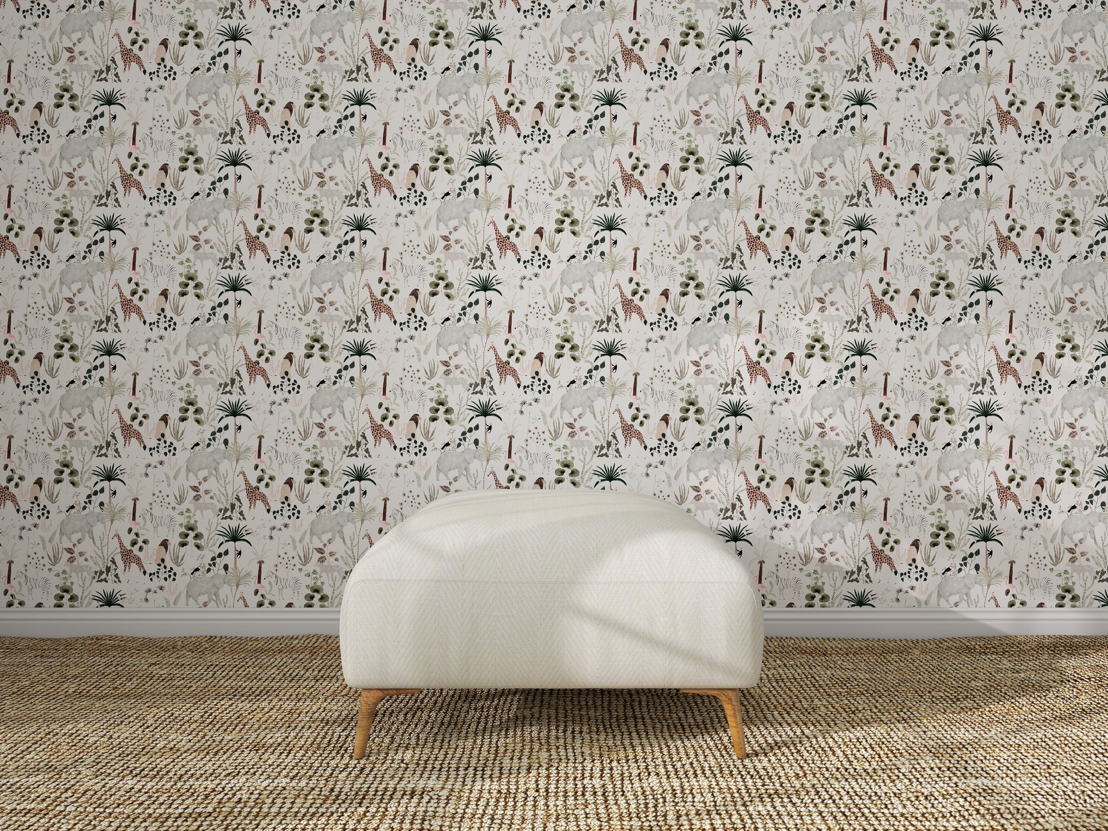 A white upholstered ottoman sits on a woven rug in front of a wall decorated with Jungle Dreams Wallpaper Repeat Pattern, showcasing colorful botanical and animal designs.