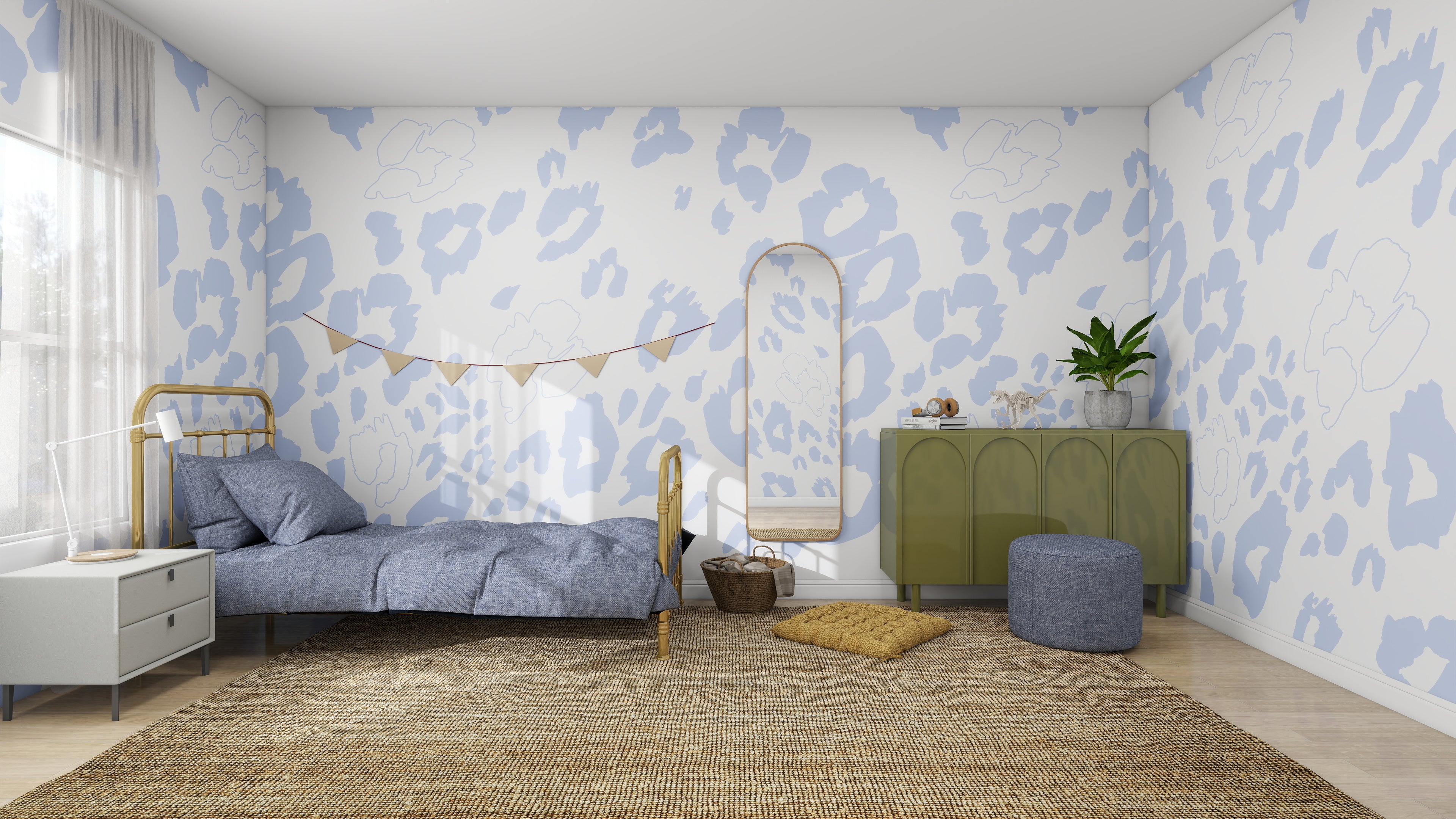 A cozy bedroom highlights Nelly Leopard Print Wallpaper by munks and me, with a bed featuring a blue duvet, green sideboard, round mirror, small nightstand, woven rug, pouf, plant, and triangular banner decoration.