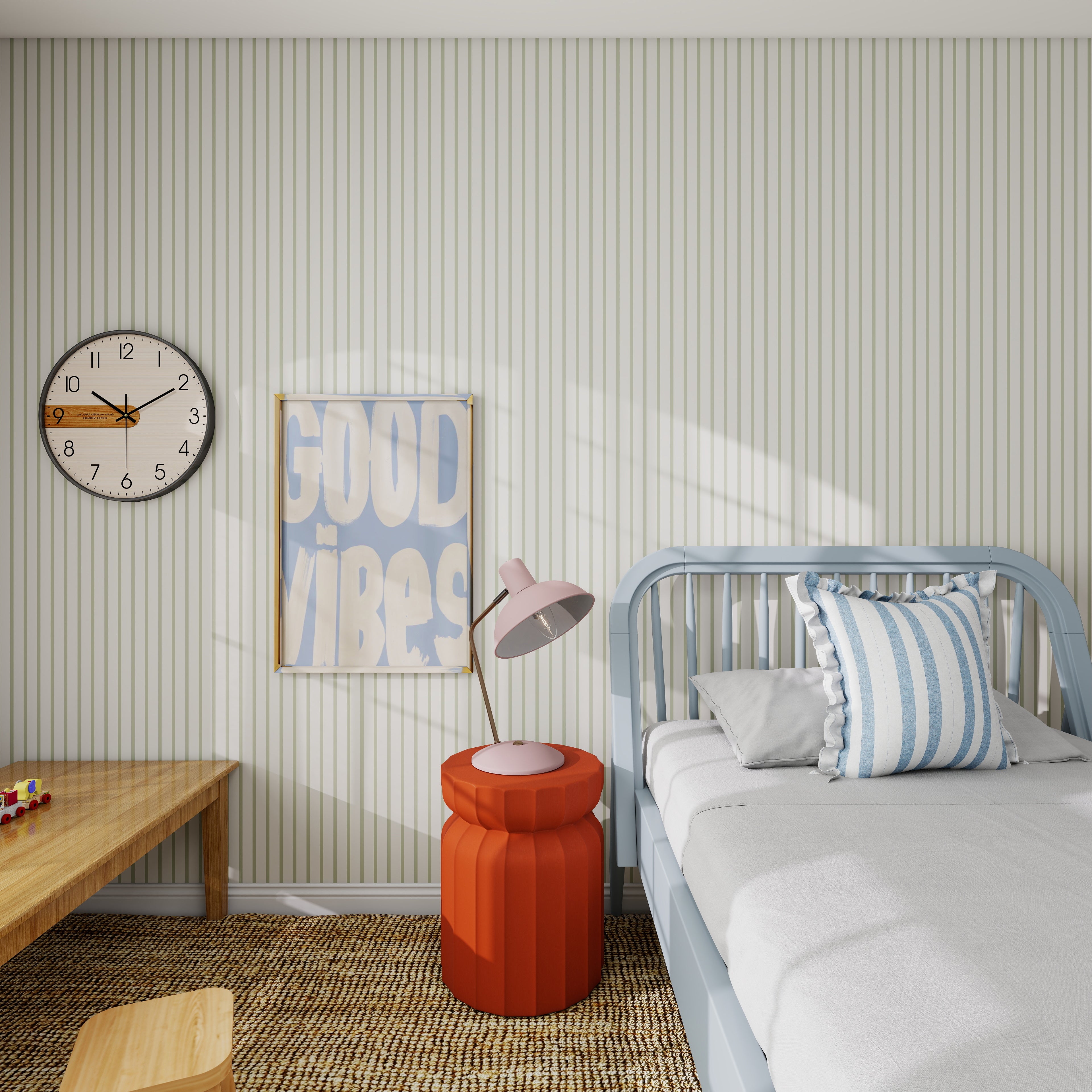A cozy bedroom features a bed, blue and white striped pillow, red side table, lamp, wooden table, wall clock, “Good Vibes” poster, and quality Pinstripe Green wallpaper. Sunlight streams in through the window.