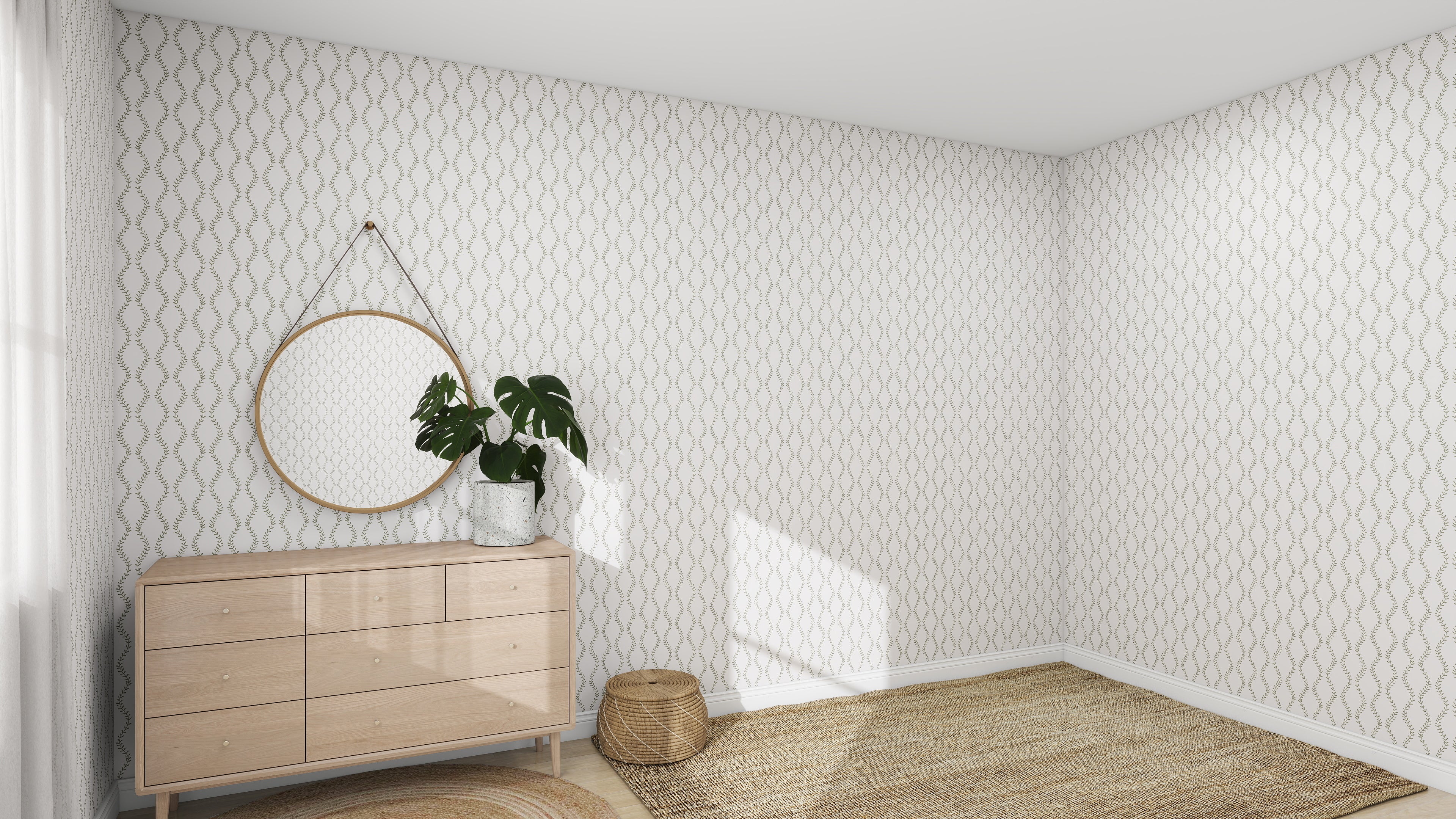 A minimalist room showcases munks and mes Vintage Vines Wallpaper Repeat Pattern for light elegance. A round mirror adorns a wooden dresser with a potted plant, while below, a woven basket and rug add cozy natural elements and hand-drawn touches.