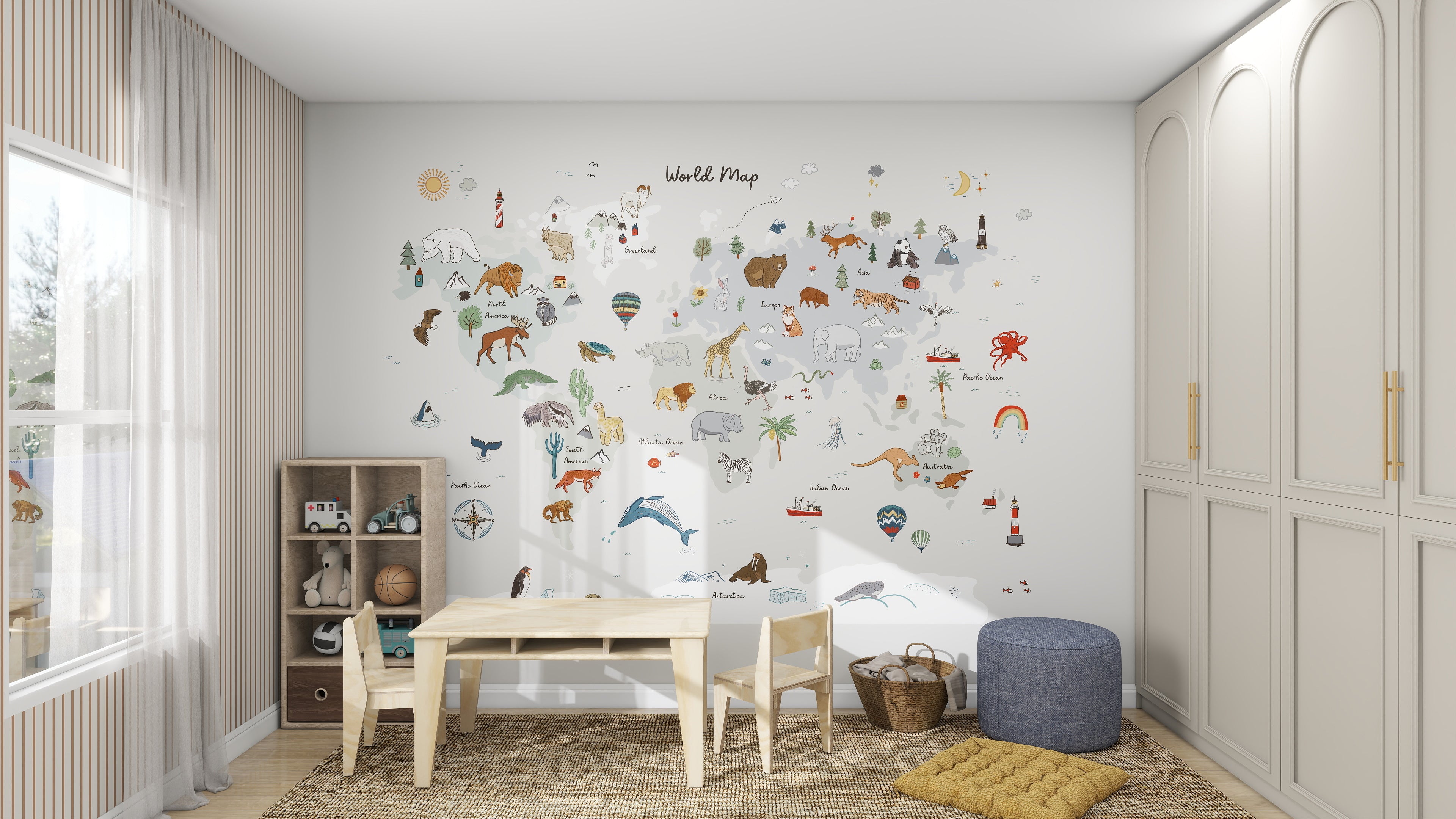 A childrens room showcases the World Map Wallpaper Mural | Grey by munks and me, featuring colorful animals. A wooden table with chairs sits centrally, a toy shelf on the left, and a blue pouf with a yellow cushion rests on a woven rug. Natural light creates an inviting space for young explorers.