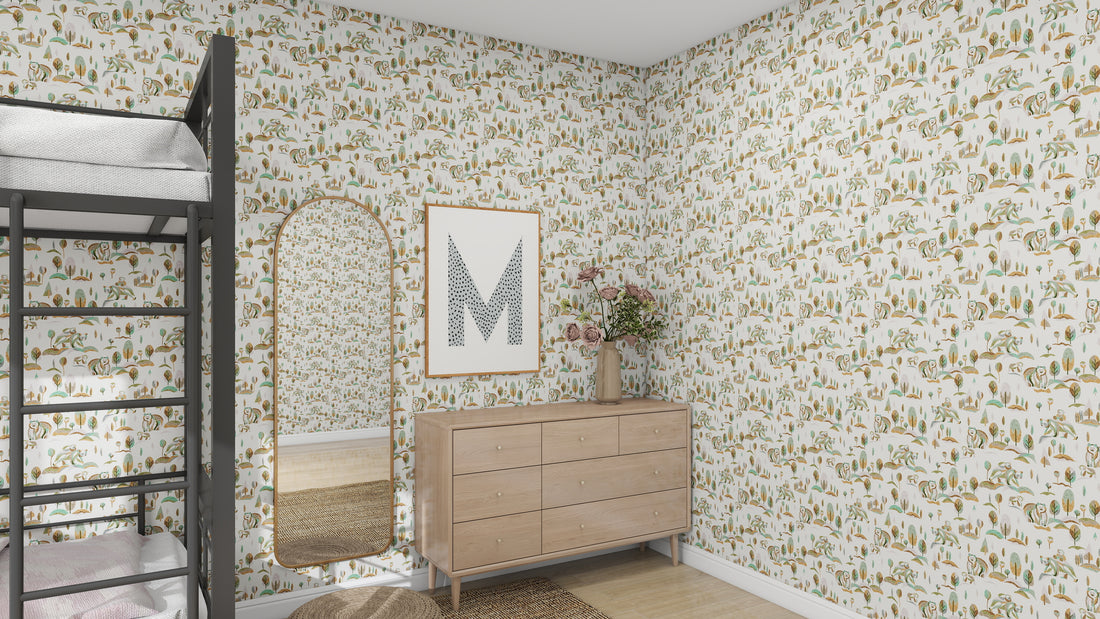 The room showcases the Winter Bears Wallpaper Repeat Pattern by munks and me, enhancing its decor. A wooden dresser with a large mirror displays pink flowers beneath a framed letter M. Natural light warms the space, highlighting a black metal bunk bed partially visible on the left.