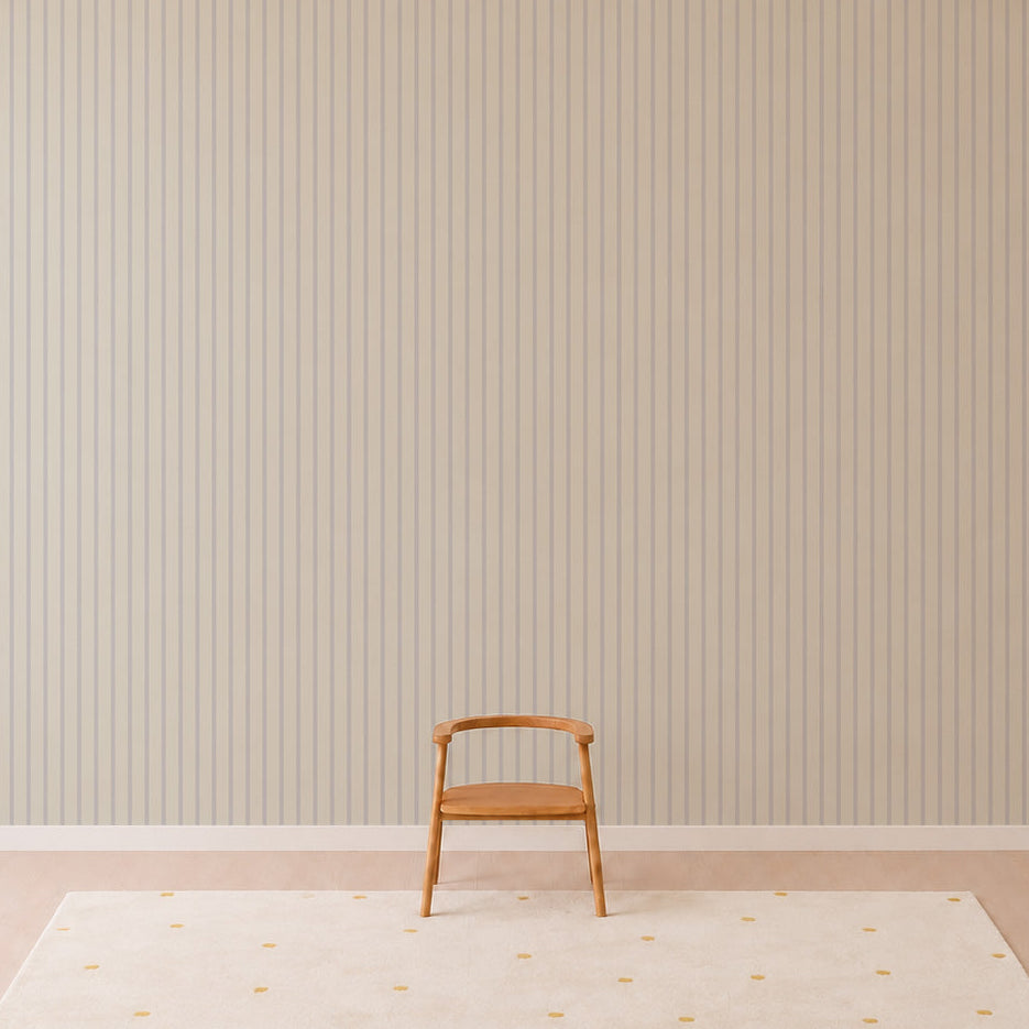 A single wooden chair sits on a light carpet with yellow dots, in front of a wall covered with Pinstripe Wallpaper Sky. The scene is minimalist and uncluttered.
