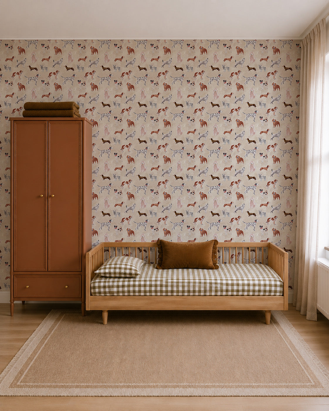 Rigby Dog Print Wallpaper, Sand, featuring a repeating pattern of handpainted dog prints in shades of brown, gray, and white on a beige background.