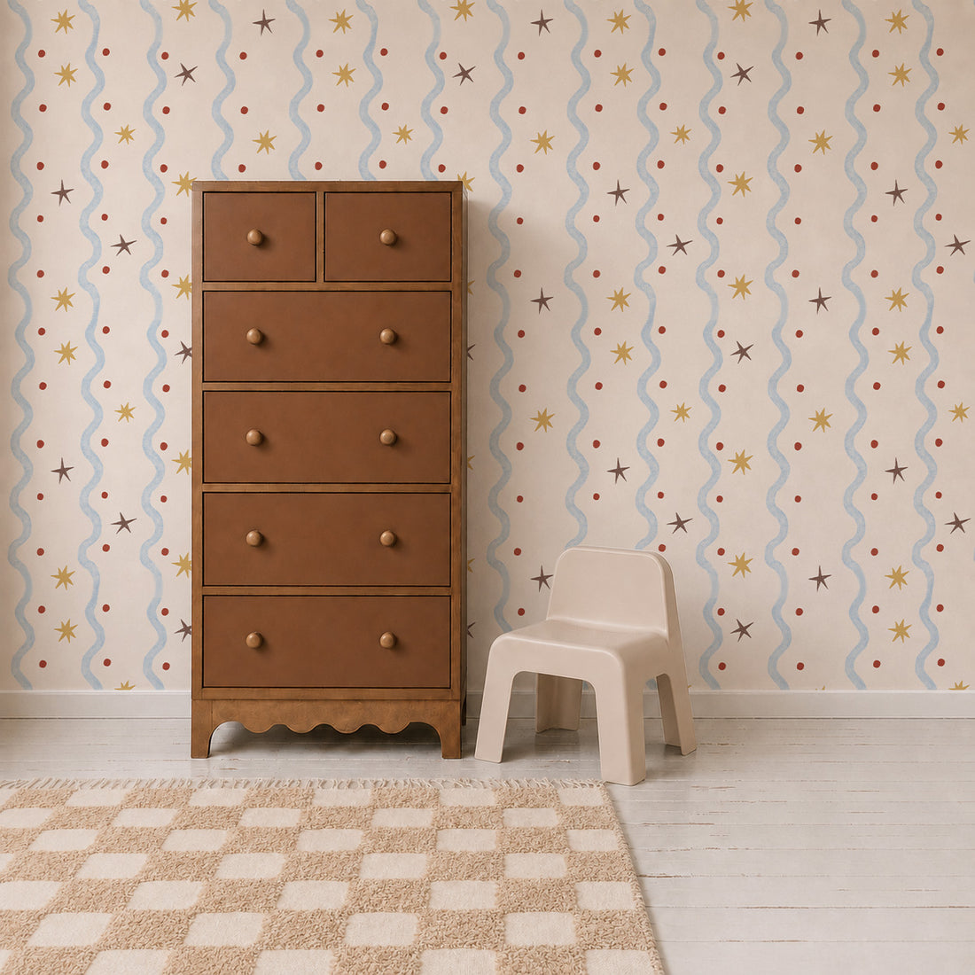 A tall brown dresser stands next to a small beige chair on a white floor with a checkered rug, against a wall adorned with Starry Wiggle Wallpaper—an enchanting nursery wallpaper featuring playful wavy patterns and star motifs.