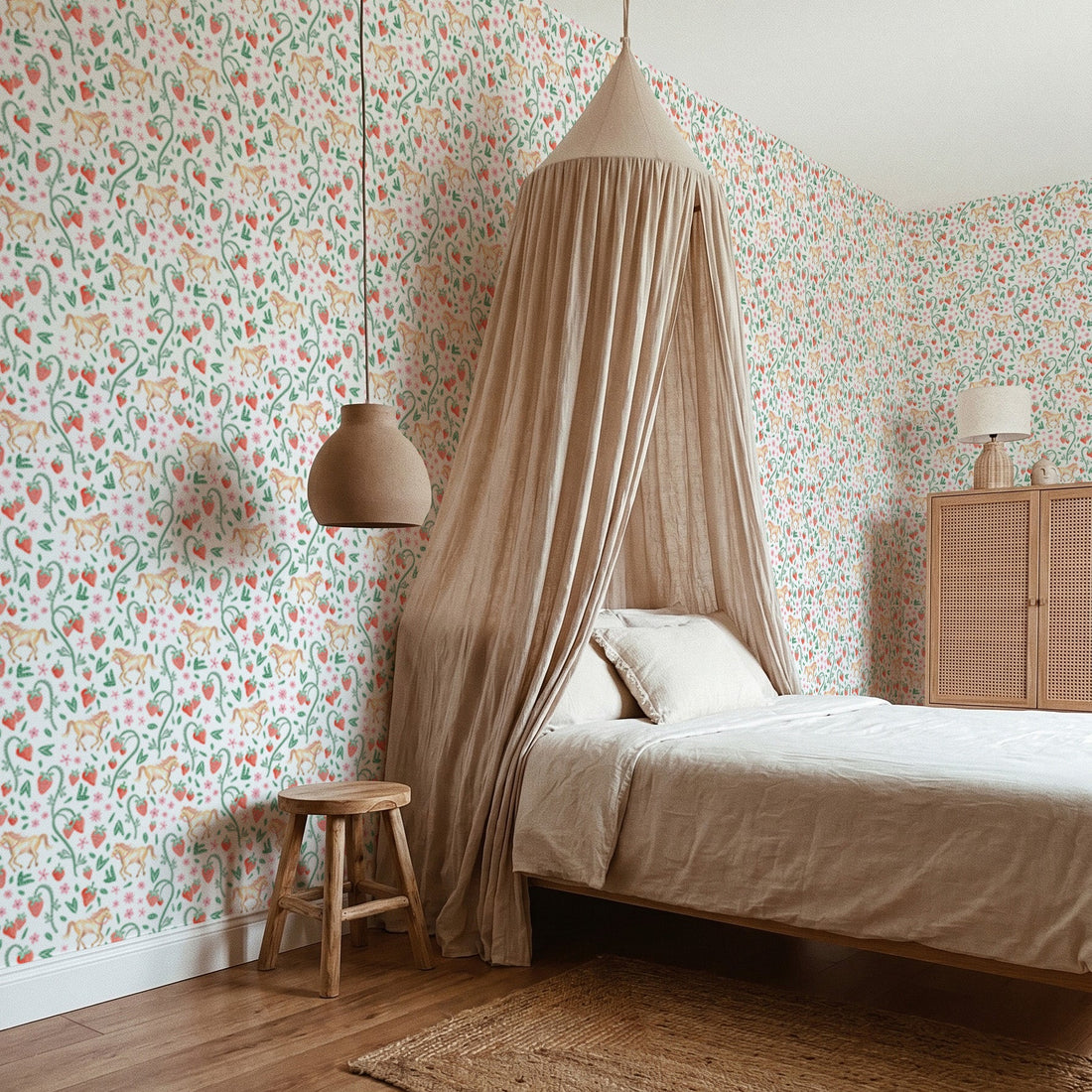 Bedroom with floral wallpaper, wooden floor, and canopy bed.