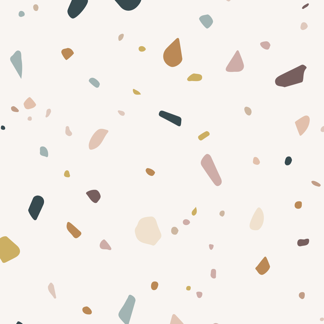 Terrazzo Spritz Wallpaper Repeat Pattern features scattered, irregular shapes in muted beige, pink, blue, mustard, and brown on white—an ideal modern accent for kids playrooms or nurseries.