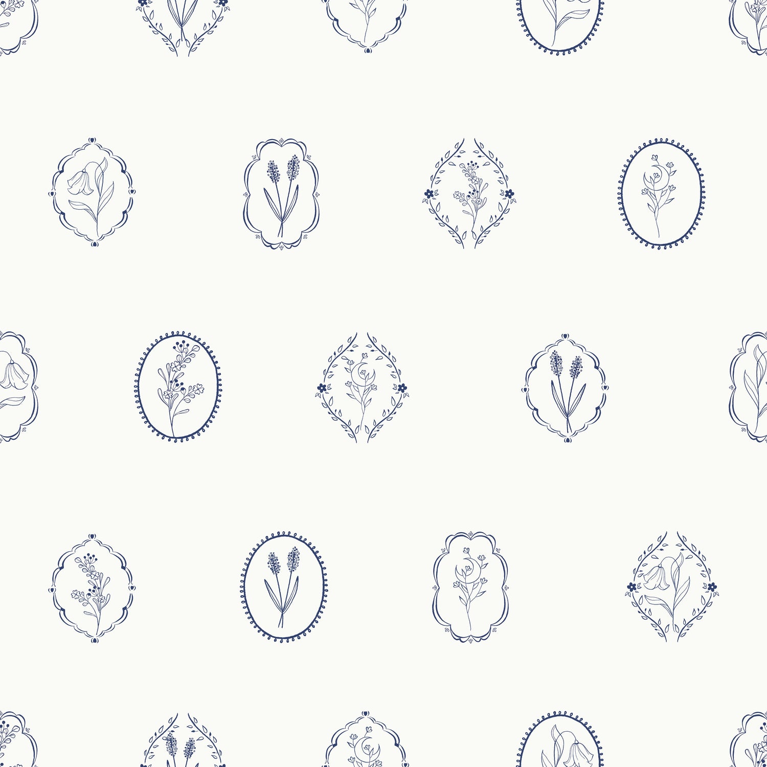 Botanic Emblem Wallpaper features a seamless pattern of delicate blue floral illustrations in oval and diamond frames, each showcasing a unique flower on a light background for an elegant, botanical look.