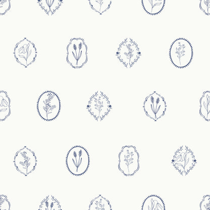 Botanic Emblem Wallpaper features a seamless pattern of delicate blue floral illustrations in oval and diamond frames, each showcasing a unique flower on a light background for an elegant, botanical look.