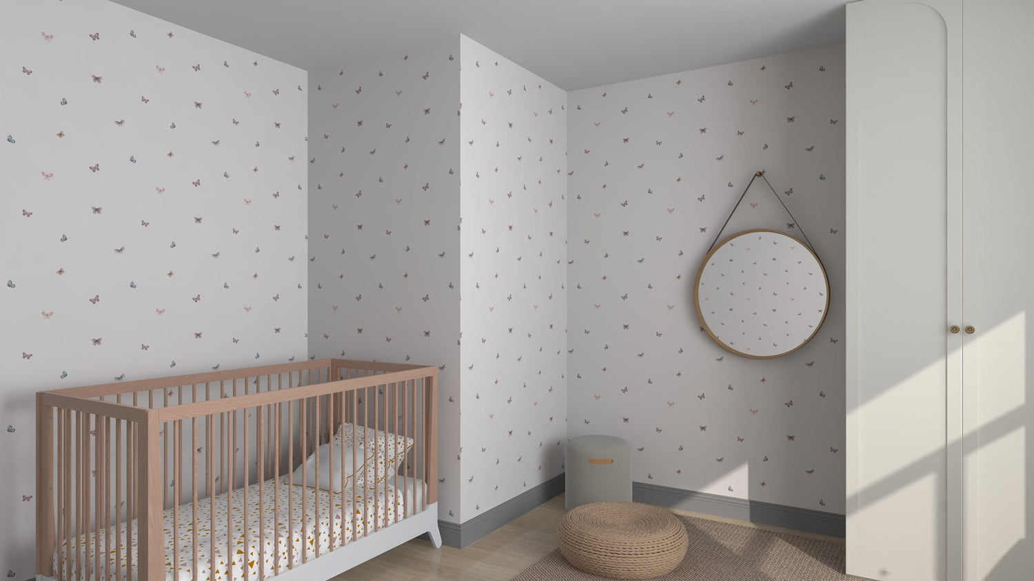 A minimalist nursery features a wooden crib on the left against Bibi Butterflies Wallpaper by munks and me. A round mirror adorns the right wall, while a woven mat and small gray bin sit on the wooden floor. Natural light enhances this serene design available through online imagery.