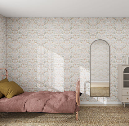 A minimalist bedroom with a single bed, pink duvet, and mustard pillows features Creatures Great and Small wallpaper by munks and me. It includes an arched mirror, beige rug, and a small cabinet to the right of the mirror. Natural light brightens the space.