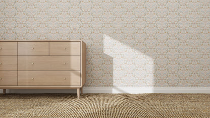 A wooden dresser with six drawers stands on a woven carpet against a wall covered in Creatures Great and Small Wallpaper Repeat Pattern. Sunlight casts shadows on the wall and part of the dresser.
