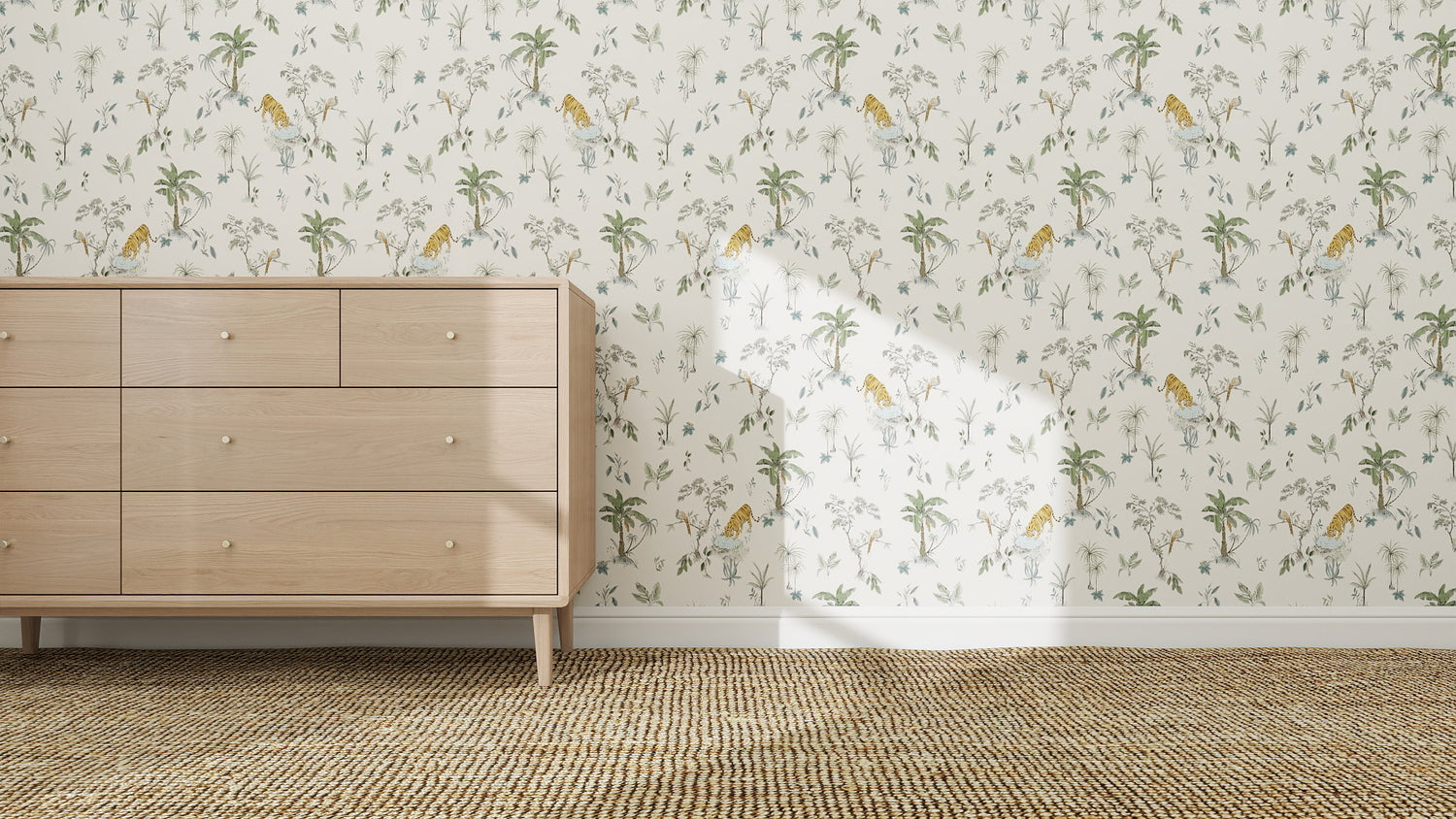 A light wood dresser stands against a wall with Tropical Tiger Wallpaper Repeat Pattern featuring tigers and palm trees; a woven rug lies on the floor as sunlight creates playful shadows across the cheerful, tropical room.