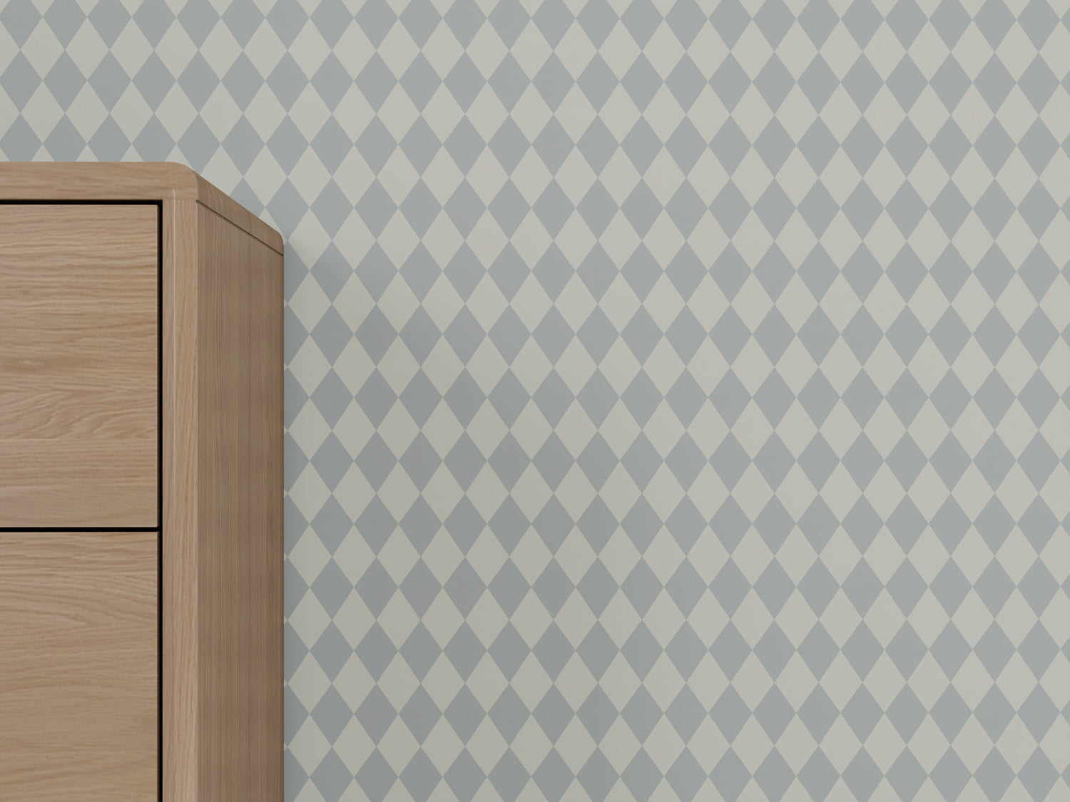 A light wood cabinet appears on the left, set against a background of Diamond Dancer Wallpaper in blue, which features pale harlequin diamonds.