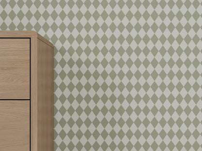 A light wood cabinet is partially visible on the left against a wall covered in Diamond Dancer Wallpaper, Green.
