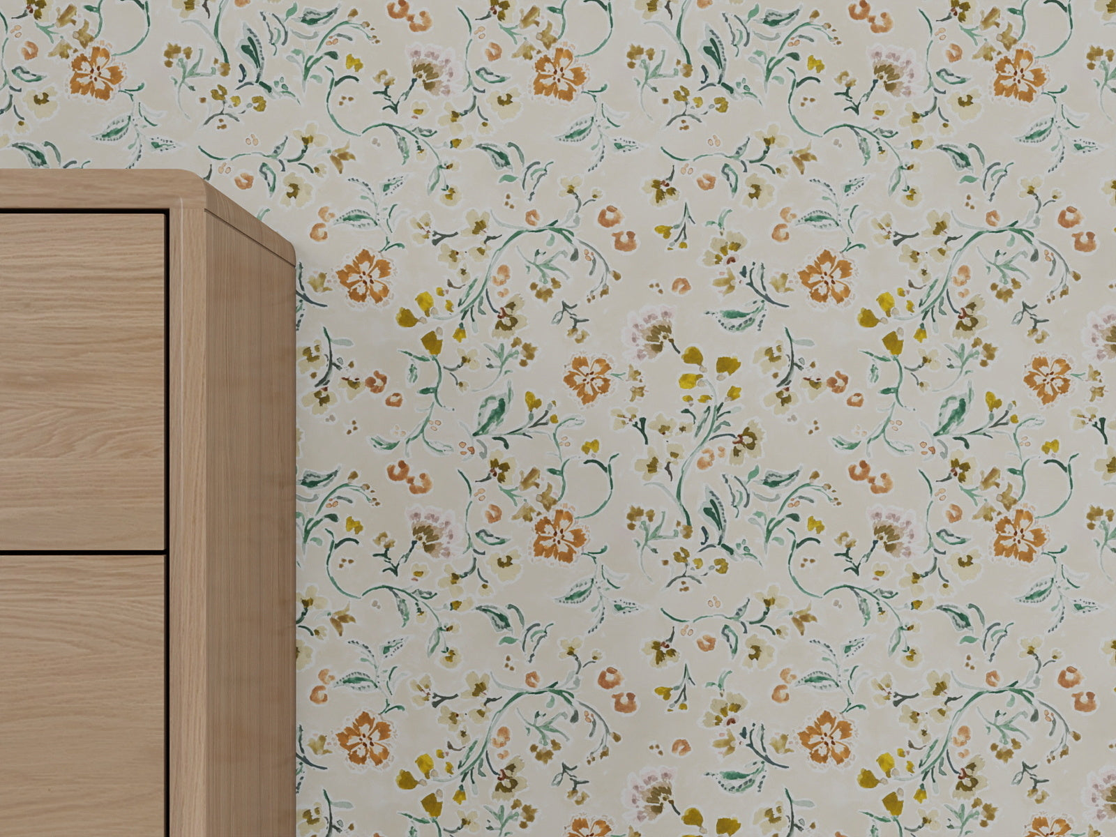 A light wall features Terra Bloom Wallpaper with hand-painted orange, yellow, and green florals. On the left is a corner of a light wood cabinet with clean, simple lines.