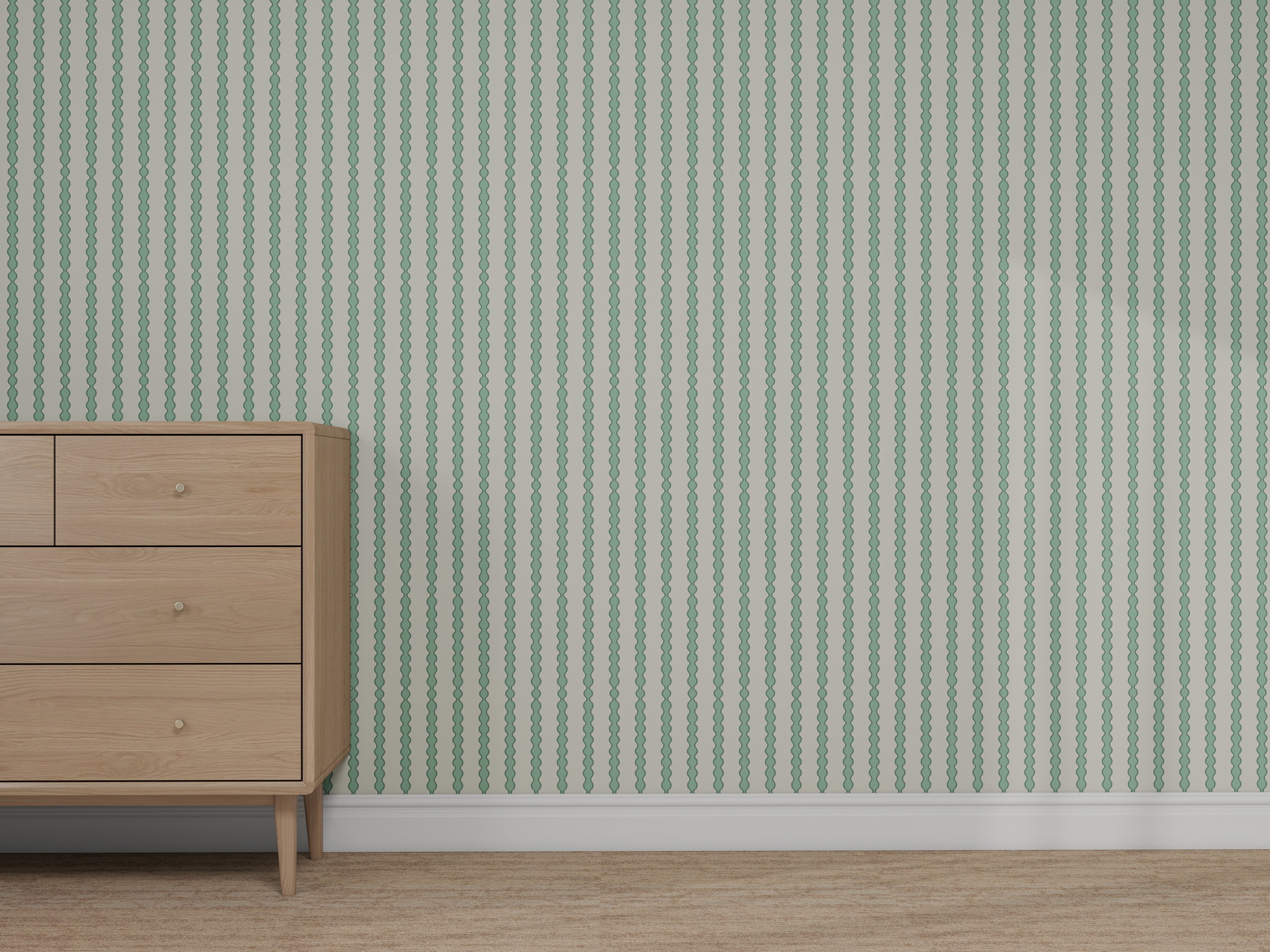 A wooden dresser sits on a carpeted floor next to a wall decorated with Custom Green Seafoam Abacus Stripe Wallpaper, highlighting its elegant green and white striped pattern.