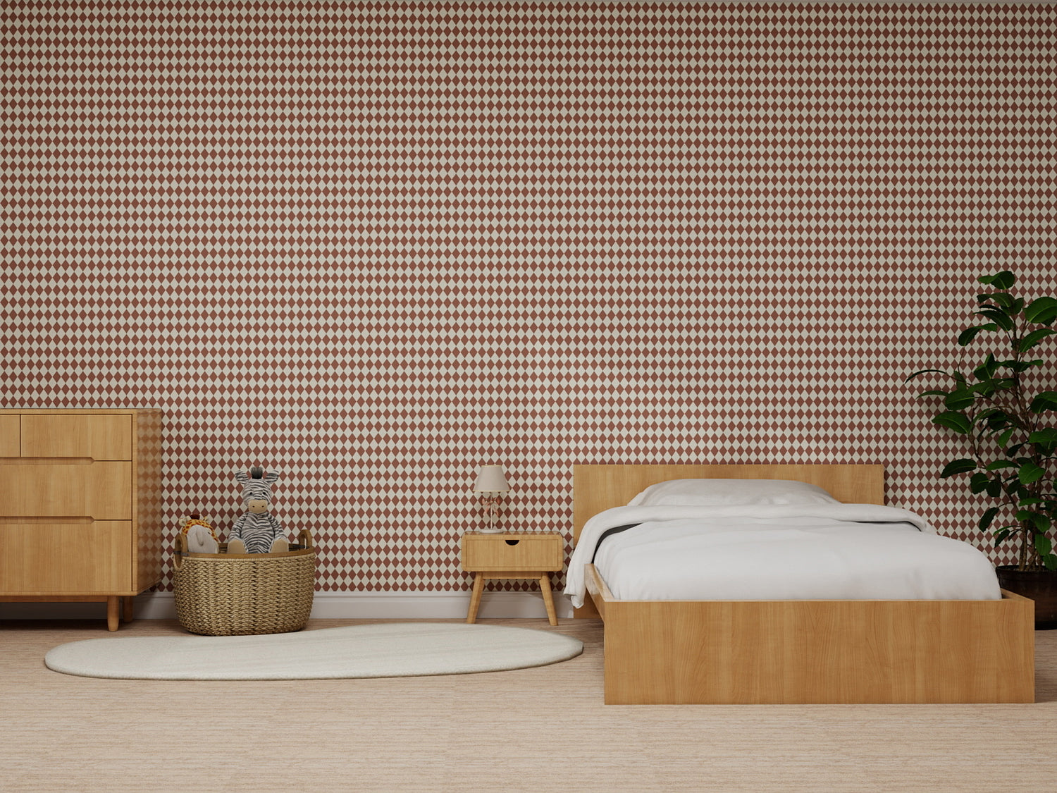 A minimalist bedroom with wood furniture features a bed, nightstand, and dresser. A large plant and stuffed animals rest on a rug, while the wall is adorned with Diamond Dancer Wallpaper in Stone Rose.