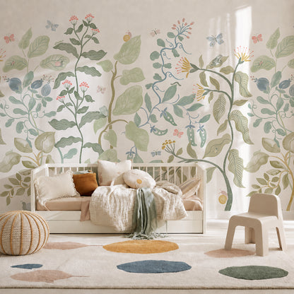 A cozy kids room with a daybed, soft pillows, a knit pouf, a small chair, and a rug with colorful spots; the wall features the Secret Garden Mural, creating a whimsical botanical scene adorned with plants, flowers, and insects.