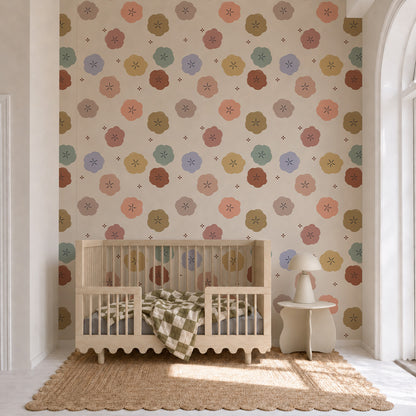 Posy Pop hand-drawn floral wallpaper with oversized colourful flowers on a warm cream background.