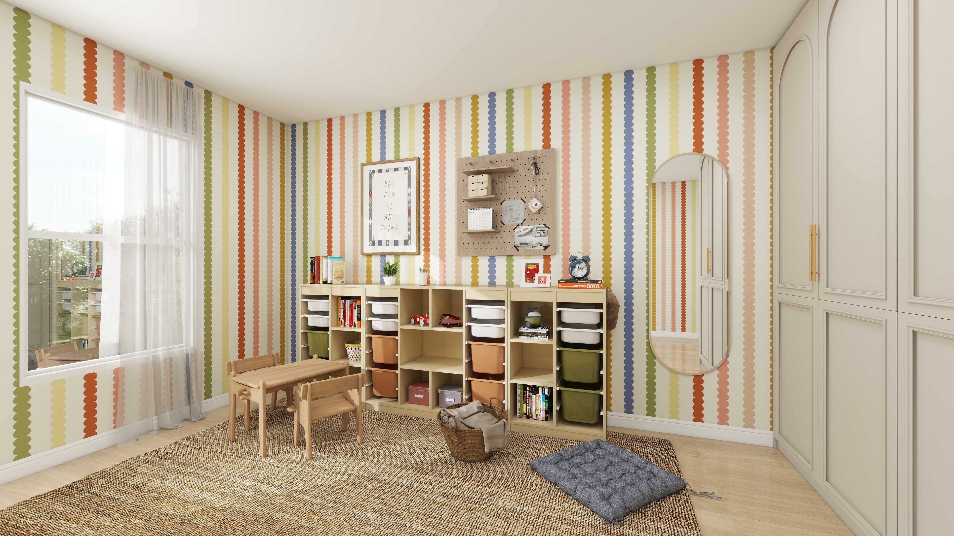 A colorful playroom features munks and mes Scallop Stripe Wallpaper in a vibrant pattern, along with a wooden table and chairs, colorful storage bins, a wicker basket, a blue cushion, and an oval mirror. Natural light fills the space through sheer-curtained windows.