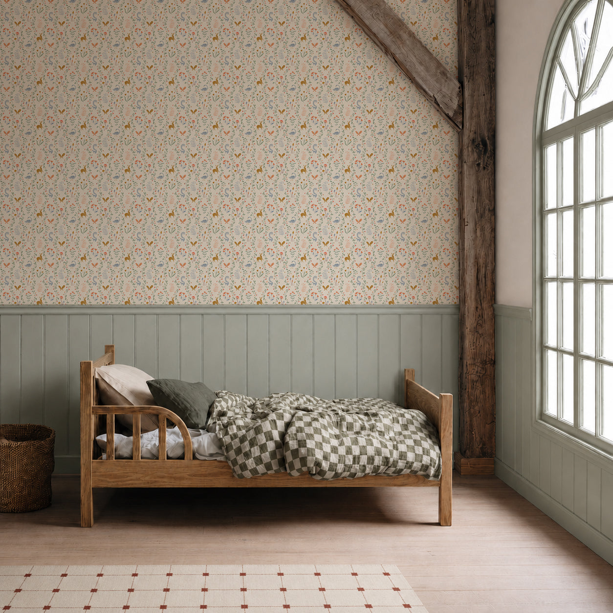 A wooden bed with checkered bedding sits in a cozy room adorned with Coles Berry Patch Wallpaper, a large arched window, and exposed wooden beams. Natural light fills the space.