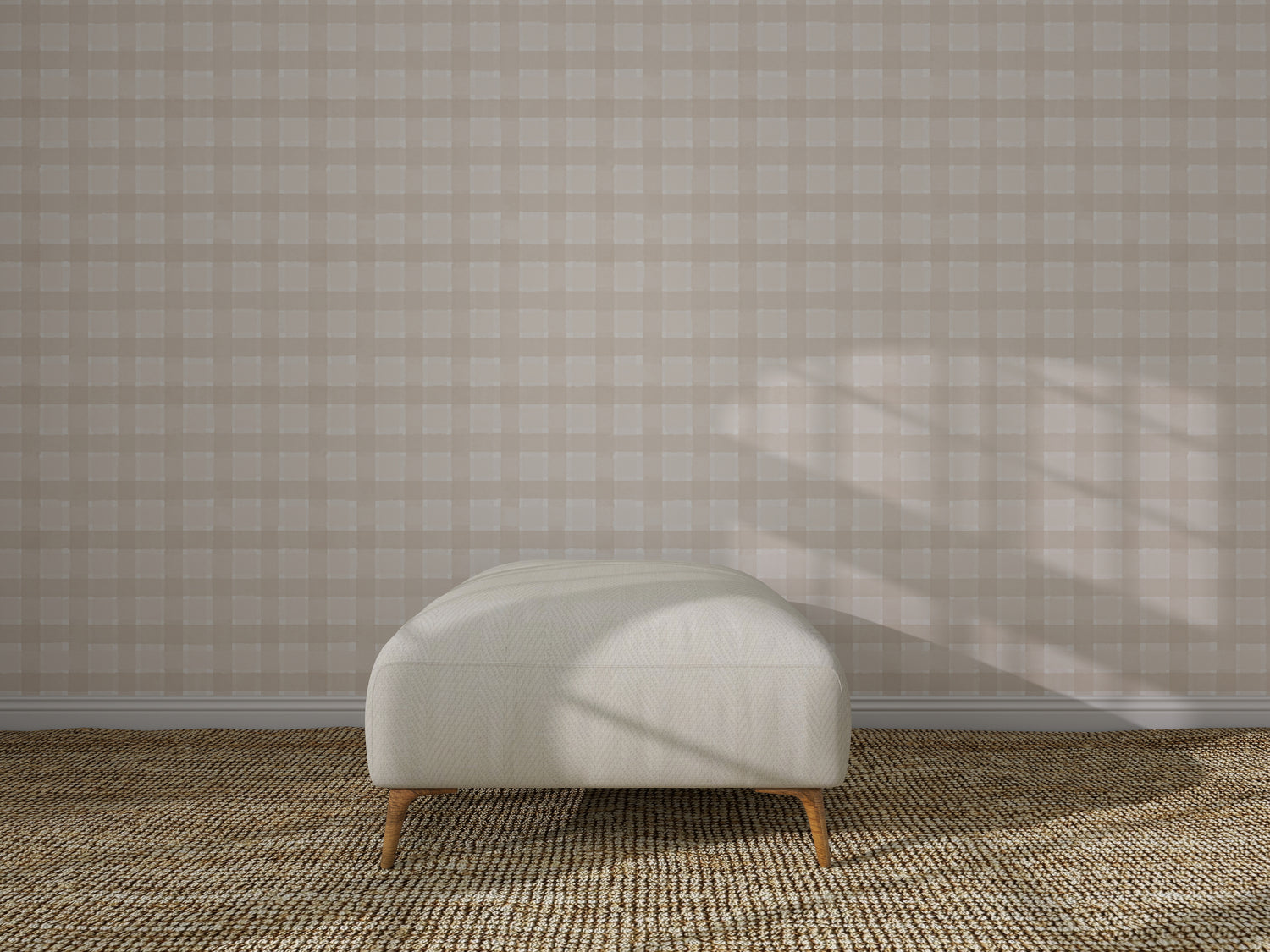 A minimalist interior showcases Checkered Wallpaper, Cream, a light upholstered bench with wooden legs, and a textured woven carpet. Sunlight casts gentle shadows, enhancing the wall decor.