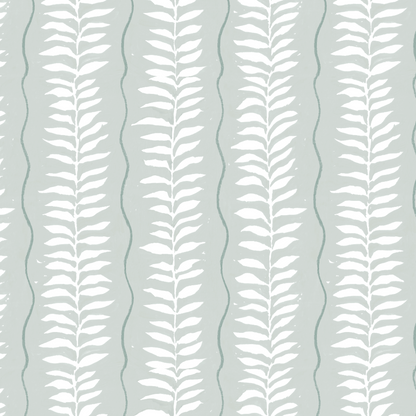 Meadow Leaf Stripe Wallpaper, Sea Foam features white leafy branches in vertical rows on a muted grayish-blue background with wavy lines between, creating a hand-drawn look—perfect as hand-painted botanical nursery wallpaper.