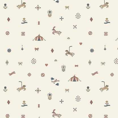 Petite Circus Party Wallpaper features a seamless cream background with playful carousel horses, circus tents, flowers, bows, diamonds, hearts, birds, and whimsical accents in soft, muted colors.