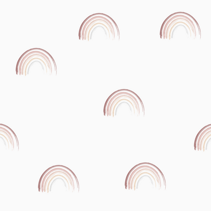 Introducing our Mini Watercolour Rainbow Wallpaper, featuring a white background adorned with seven evenly spaced pastel pink and beige rainbow arches. This charming repeat pattern is perfect for adding a whimsical touch to any space.