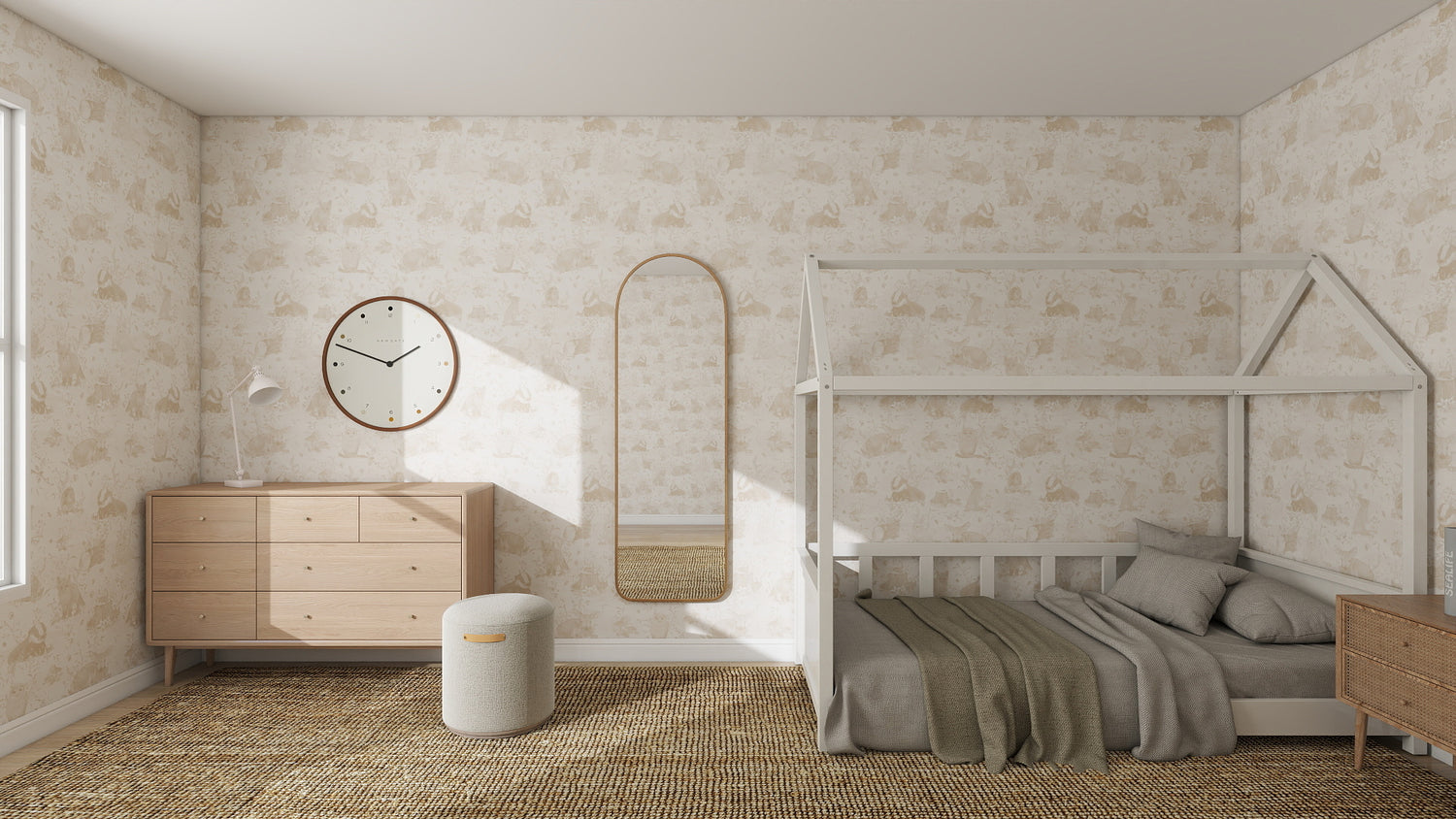 A cozy bedroom with a house-shaped bed, beige bedding, tall mirror, circular wall clock, dresser, round ottoman, and natural light highlights the Woodland Wonder Repeat Pattern Neutral wallpaper sample and a colorful woven rug.