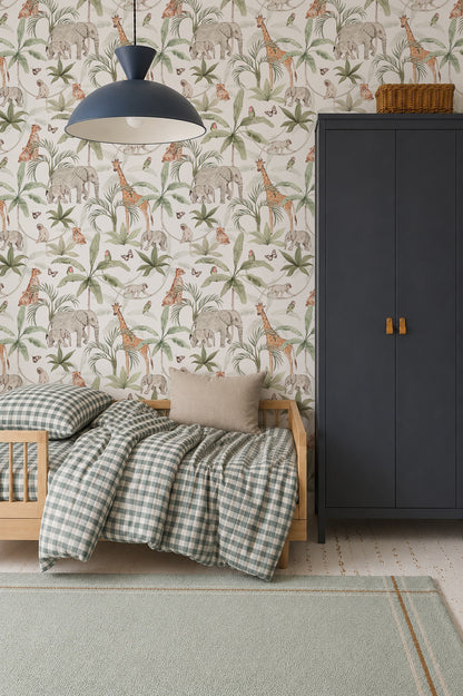 A cozy kids’ room features a small wooden bed with checkered bedding, gray pillow, dark wardrobe, and vibrant African Safari Wallpaper showcasing elephants, giraffes, and birds. A blue pendant lamp hangs overhead.