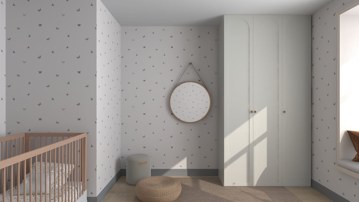 In a modern nursery, Bibi Butterflies Wallpaper Repeat Pattern by munks and me adds charm with its subtle details. A wooden crib sits under a round mirror on the left, a beige wardrobe on the right, while a woven pouf and small bin complete the cozy scene on the wooden floor.