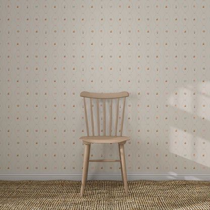 A simple wooden chair rests on a woven rug in front of a cream wall decorated with Little Patisserie Stripe Wallpaper, featuring subtle, vintage-style hand-drawn stripes.