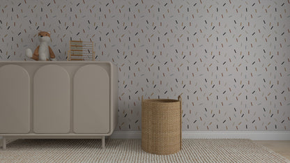 A modern nursery with a light dresser, plush fox toy, abacus, woven basket, and Confetti Wallpaper Repeat Pattern in neutral-colored scattered dashes. A textured rug covers the floor.