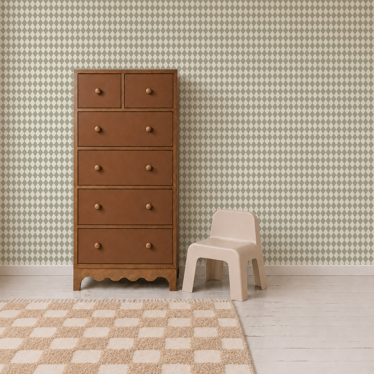 Brown dresser with six drawers beside a small beige plastic chair, on a light wood floor with a checked rug, and Diamond Dancer Wallpaper in green in the background.