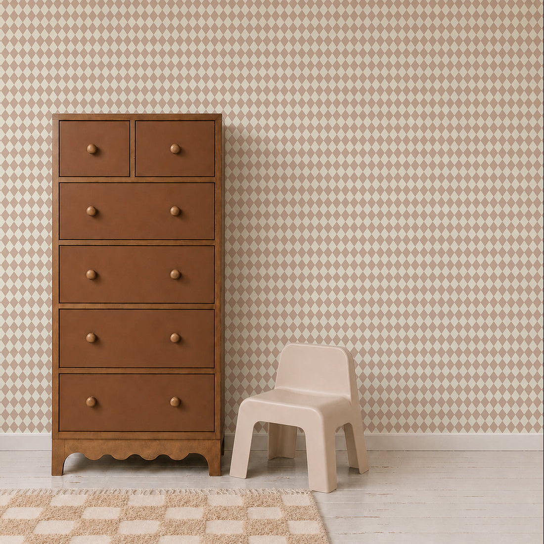 A tall brown dresser stands next to a small beige plastic chair in a room with Diamond Dancer Wallpaper, Rose and a matching checkered rug on a light wooden floor.