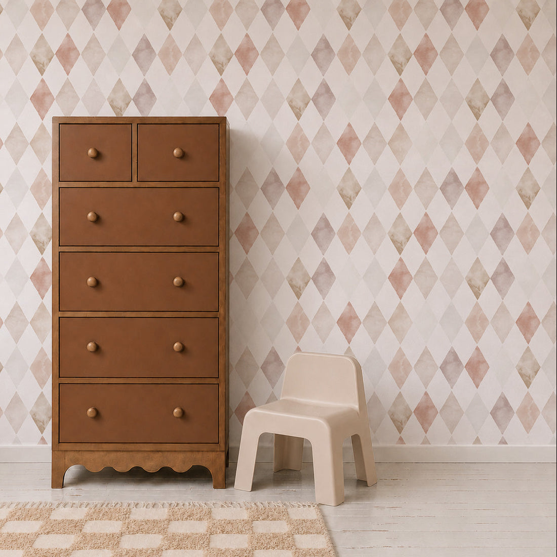 A tall brown wooden five-drawer dresser with round knobs stands next to a small cream plastic chair in a styled room with a diamond-patterned wallpaper, checkered rug, and light wood floor.