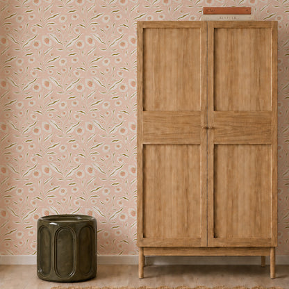 A wooden wardrobe stands next to a green ceramic stool against whimsical wall decor featuring Matildas Sunflower Wallpaper, Pink, in a minimalist room with a light wood floor.