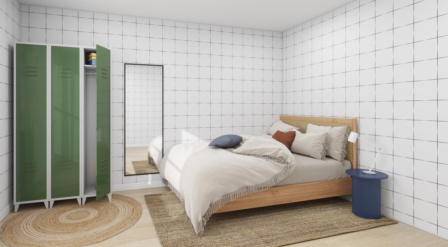 A modern bedroom features munks and mes Urban Grid Wallpaper Repeat Pattern, a wooden bed with neutral bedding and assorted pillows. A tall green locker stands beside a floor mirror, complemented by a blue side table and circular woven rug for a contemporary look.